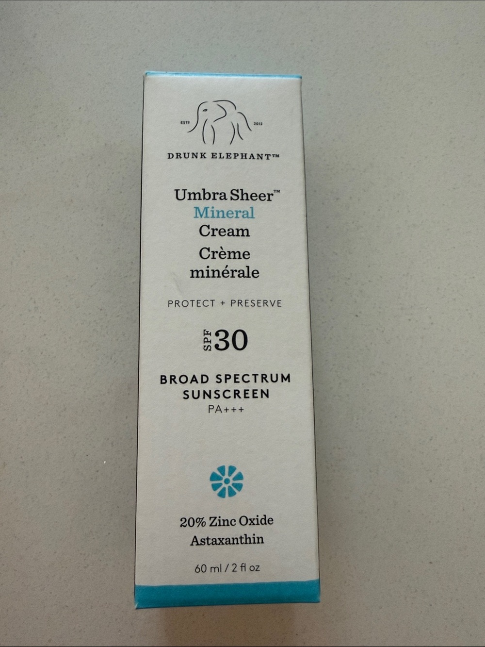 Drunk Elephant Umbra Sheer Mineral Cream SPF 30 - White with Teal Accents